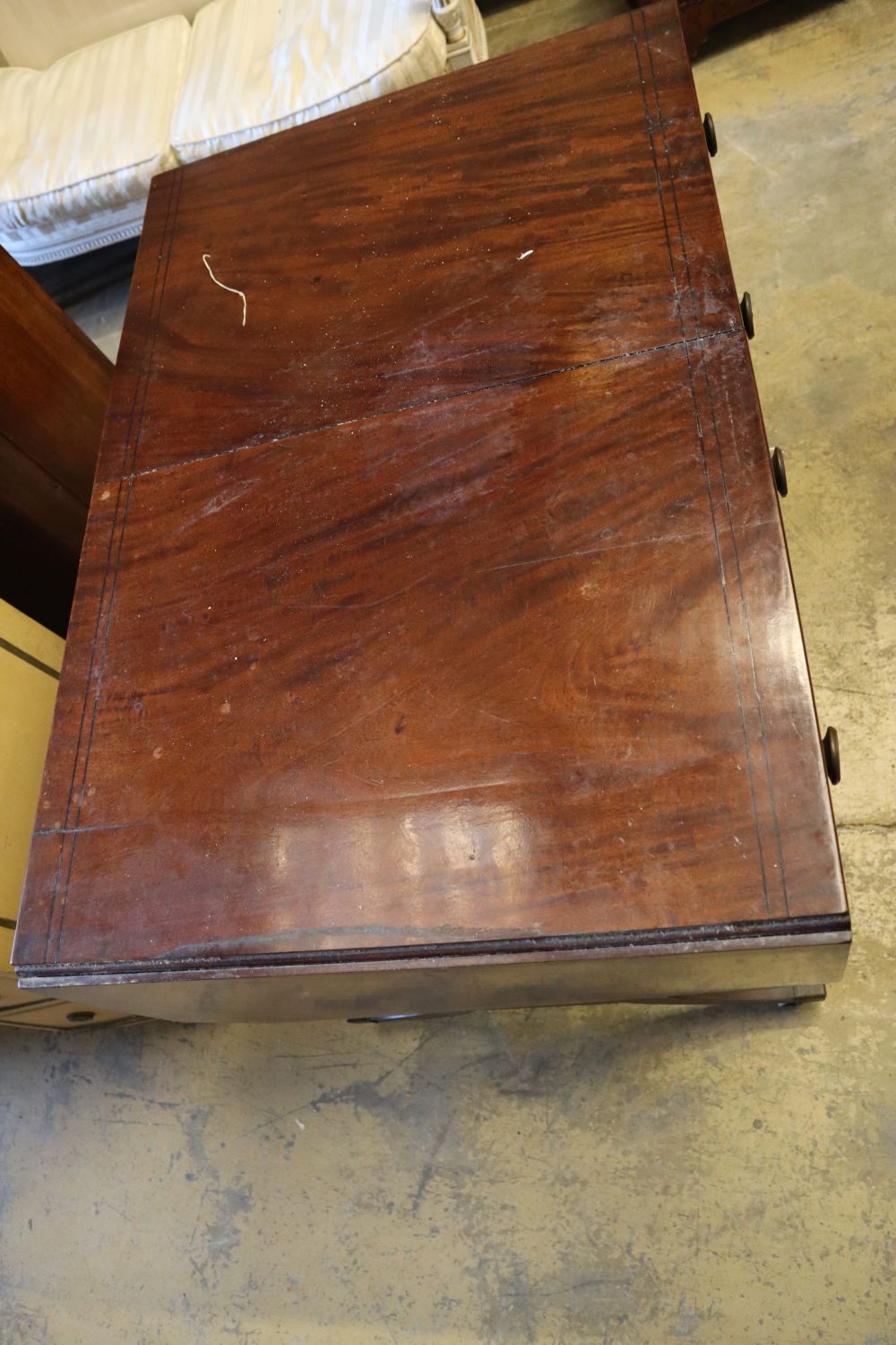 A Regency mahogany sofa table, with ebony stringing, and two frieze drawers, width 97cm